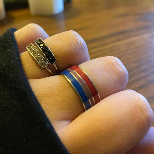 Stylish bisexual pride stainless steel ring with a bold, geometric design in vibrant colours