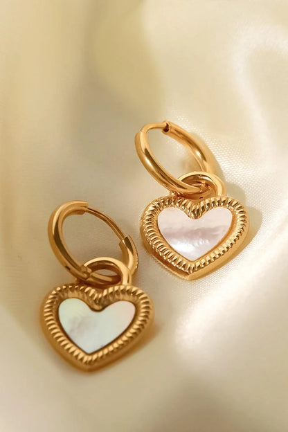 Inlaid shell heart drop earrings in gold, featuring a sophisticated and versatile design for any occasion.