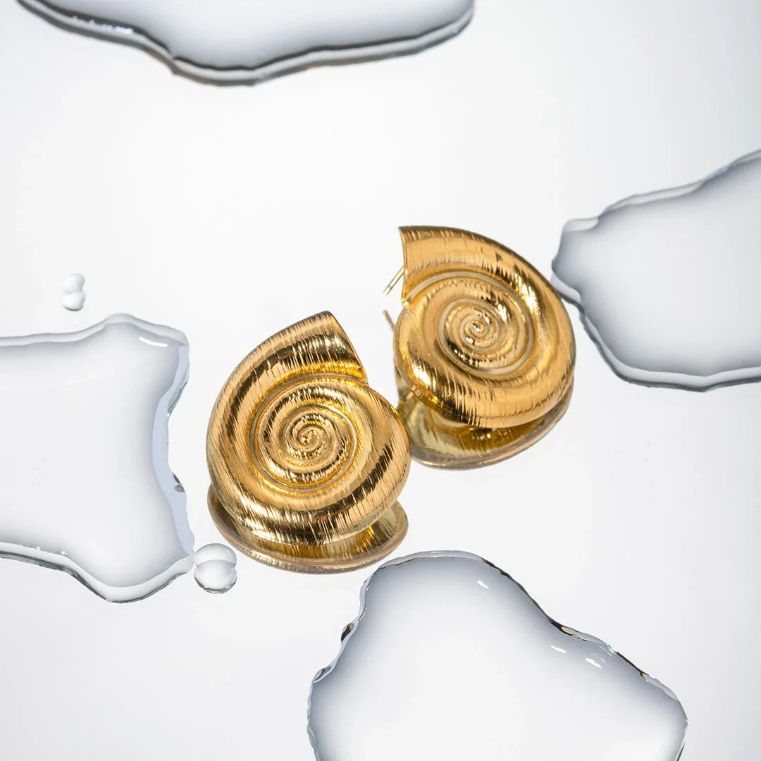 Pair of gold-plated stainless steel spiral conch earrings with a unique textured design