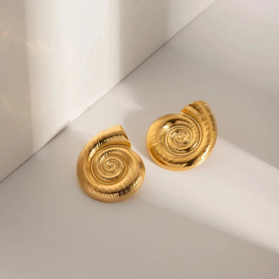 Pair of gold-plated stainless steel spiral conch earrings with a unique textured design
