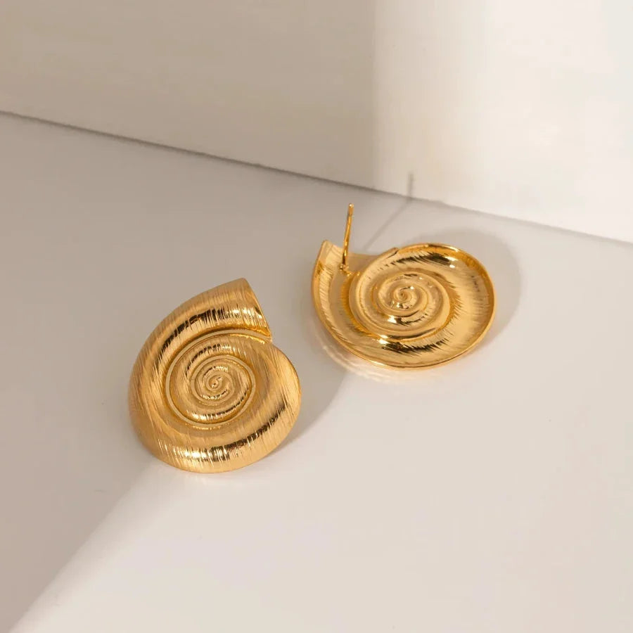 Pair of gold-plated stainless steel spiral conch earrings with a unique textured design