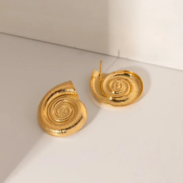 Pair of gold-plated stainless steel spiral conch earrings with a unique textured design