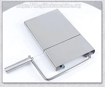 Stainless steel cheese slicer cutter with adjustable thickness and non-slip handle, perfect for slicing soft and hard cheeses