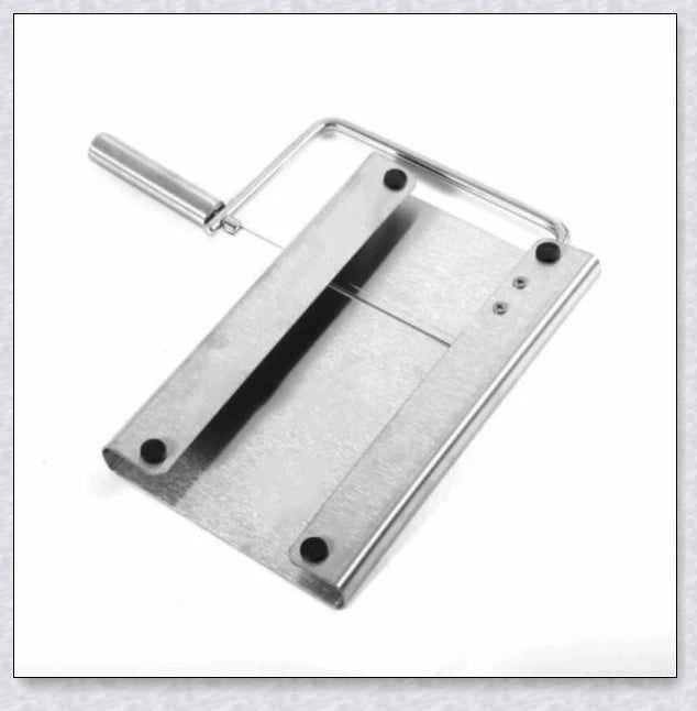Stainless steel cheese slicer cutter with adjustable thickness and non-slip handle, perfect for slicing soft and hard cheeses