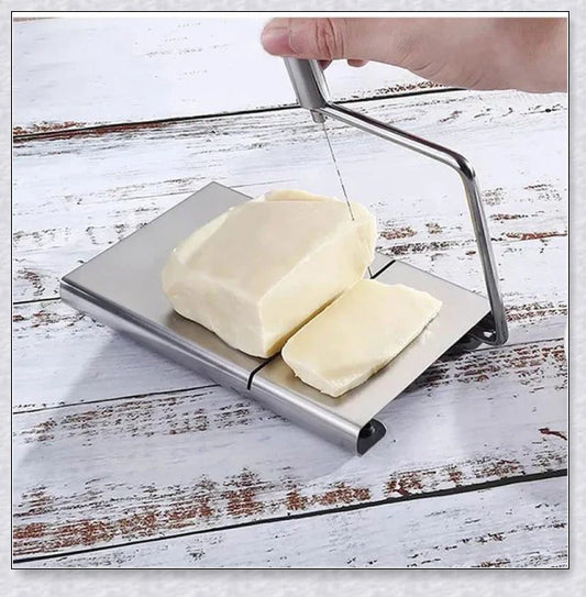 Stainless steel cheese slicer cutter with adjustable thickness and non-slip handle, perfect for slicing soft and hard cheeses