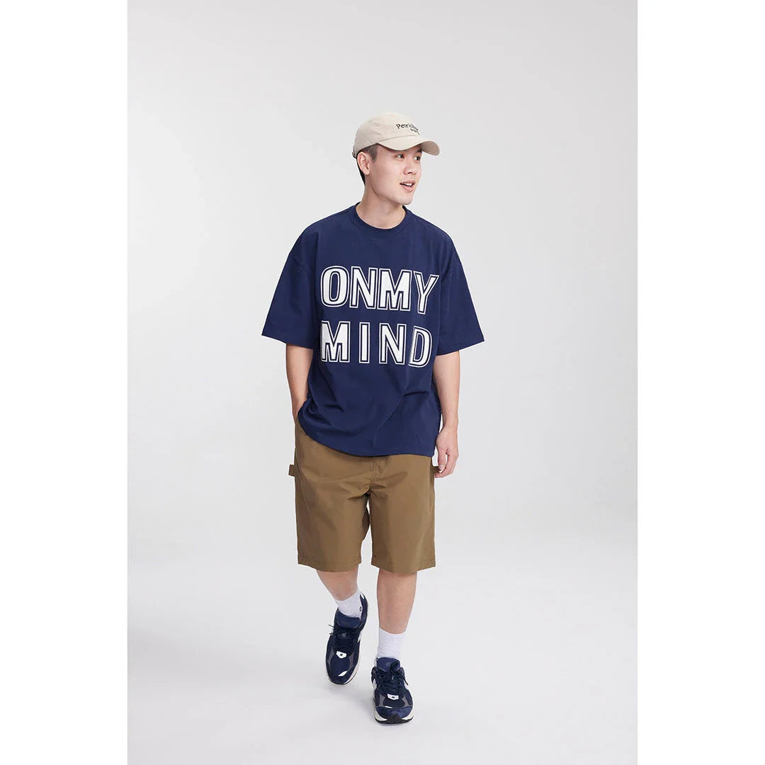 Japanese-inspired retro cargo shorts in khaki and black colours, featuring a loose, straight-leg fit and generous pockets for versatile style and comfort.