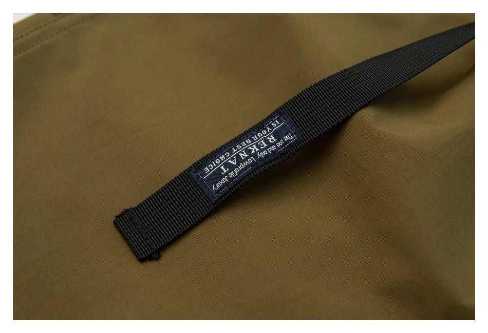Japanese-inspired retro cargo shorts in khaki and black colours, featuring a loose, straight-leg fit and generous pockets for versatile style and comfort.