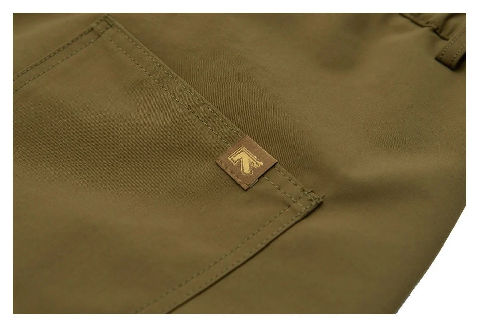 Japanese-inspired retro cargo shorts in khaki and black colours, featuring a loose, straight-leg fit and generous pockets for versatile style and comfort.
