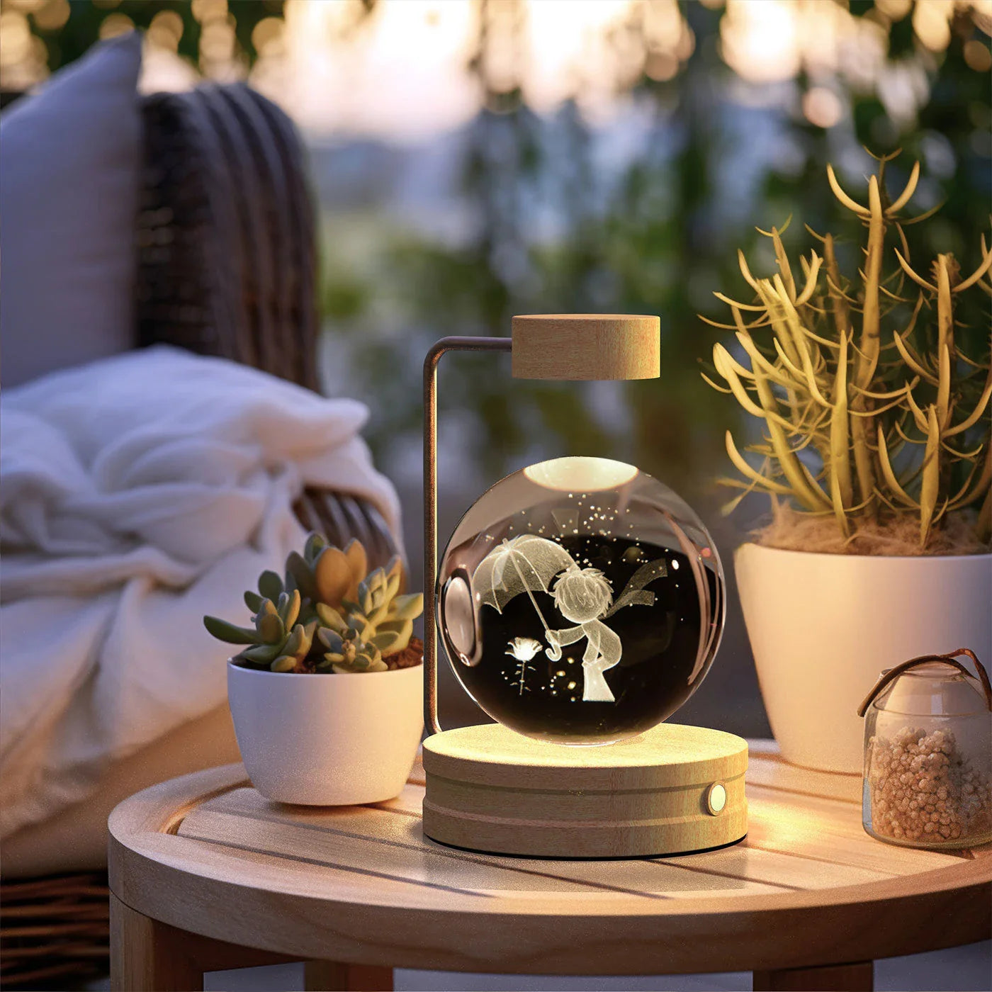 Enchanting crystal ball night light with cosmic designs, creating a warm and soothing ambiance in any room.