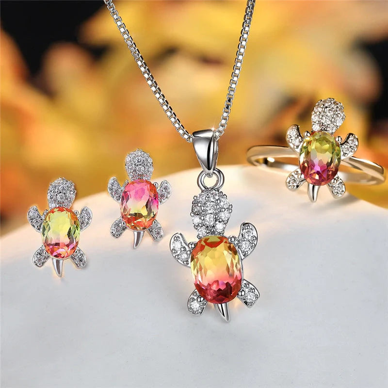 Stylish turtle pendant necklace with vibrant rainbow stones, perfect for women and children.