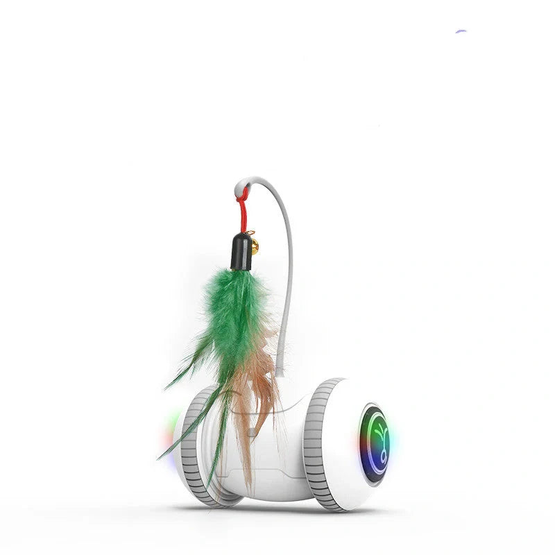 Interactive robotic cat toy with interchangeable feather and plush chick heads