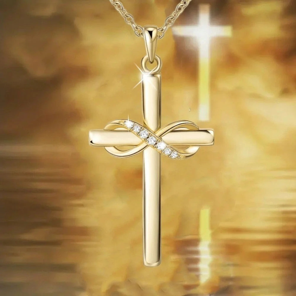 Elegant cross and infinity symbol pendant necklace in gold and silver tones, made with premium materials for a sophisticated and long-lasting accessory.