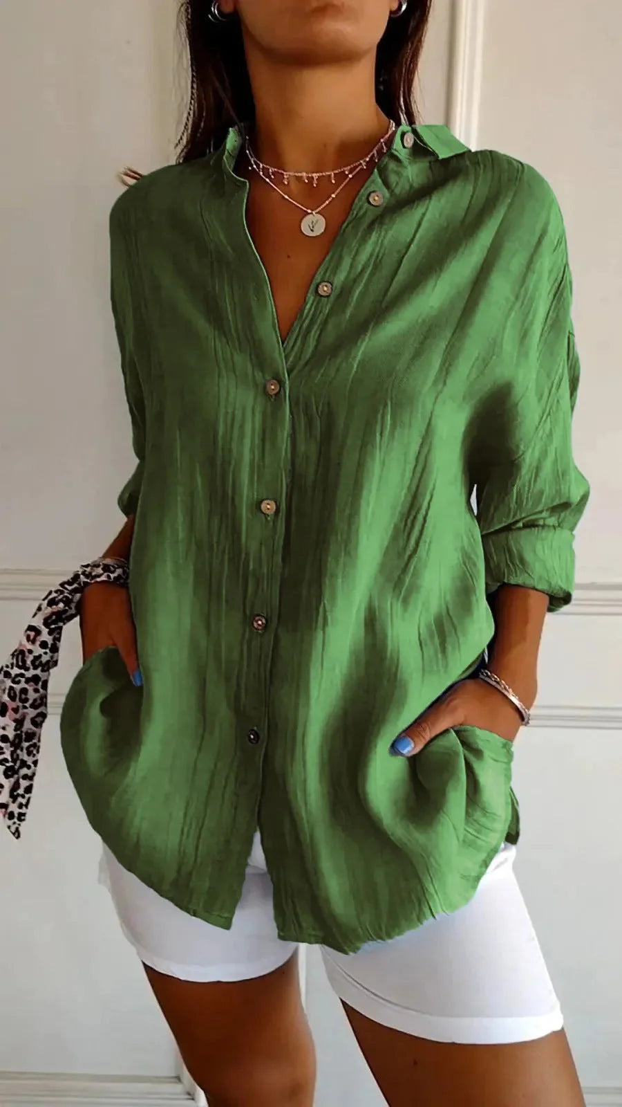 A stylish long-sleeved shirt with a pleated design, available in a variety of colours to suit any occasion.