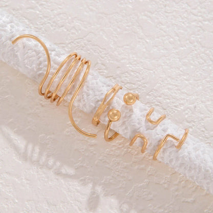 Stylish retro wave open ring in gold, perfect for elevating any outfit