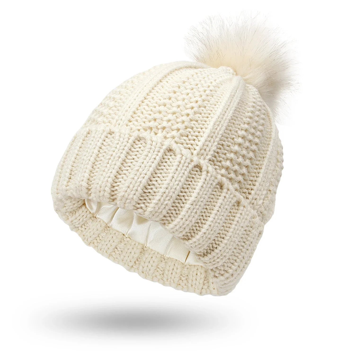 Stylish knit beanie with satin lining and faux fur pom-pom for women, available in multiple color options