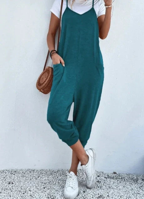 Sleeveless sling jumpsuit in various colours, showcasing versatile design and loose-fitting silhouette