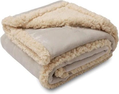 Plush Sherpa Pet Blanket in various colors and sizes, designed for comfort and warmth for your furry friend