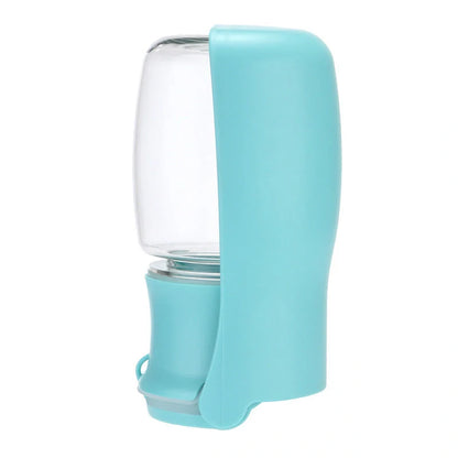 Foldable dog water bottle in blue, white, and pink, perfect for outdoor adventures with your pet.