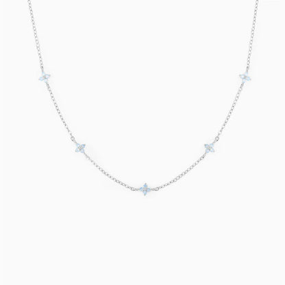 Elegant floral statement necklace in various color options, including golden blue, silver blue, golden green, and silver green, with an adjustable chain and high-quality construction.