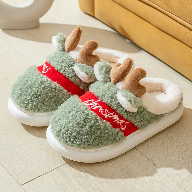 Cozy elk-themed slippers in a variety of festive colors, featuring a plush suede upper and supportive EVA sole for maximum comfort and warmth.