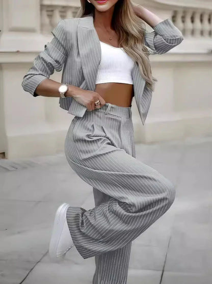 Fashionable striped suit sets featuring cropped tops and straight-leg pants in various color options