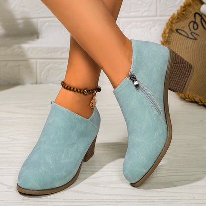 Women's chunky heel ankle boots with side zipper in navy blue, black, and khaki