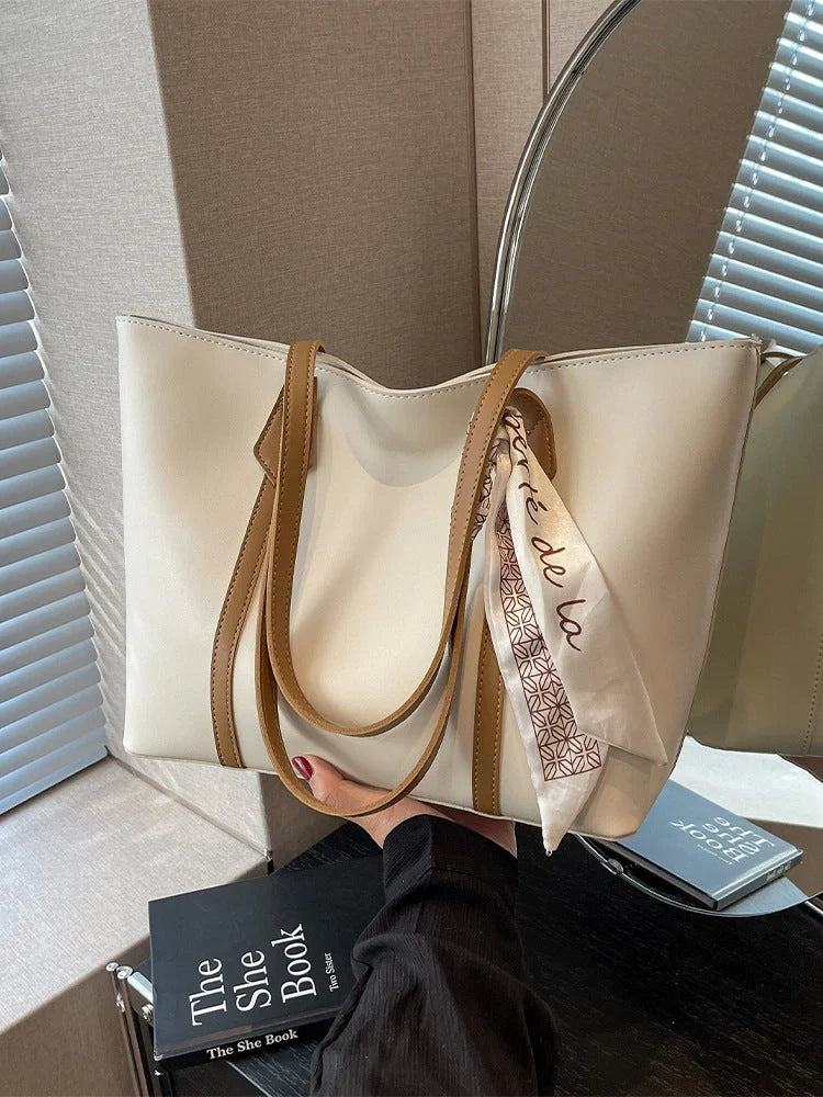 Stylish large capacity tote bag in various colours, perfect for fashion and functionality