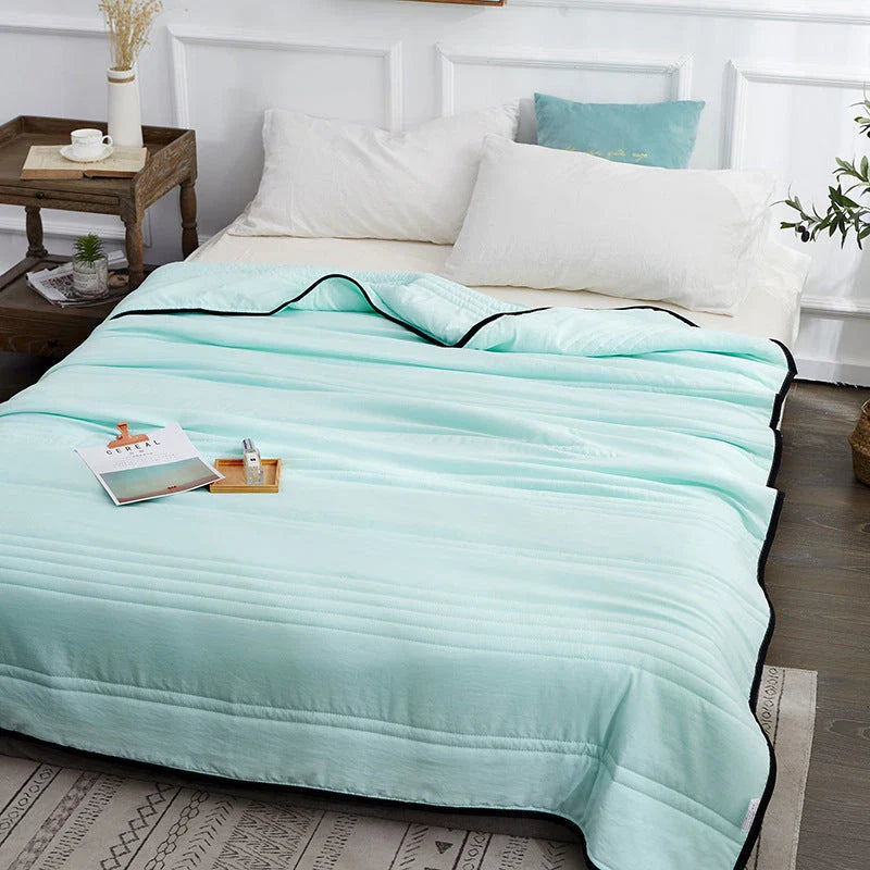 Premium cooling quilts in various colors and sizes for comfortable, temperature-regulating sleep