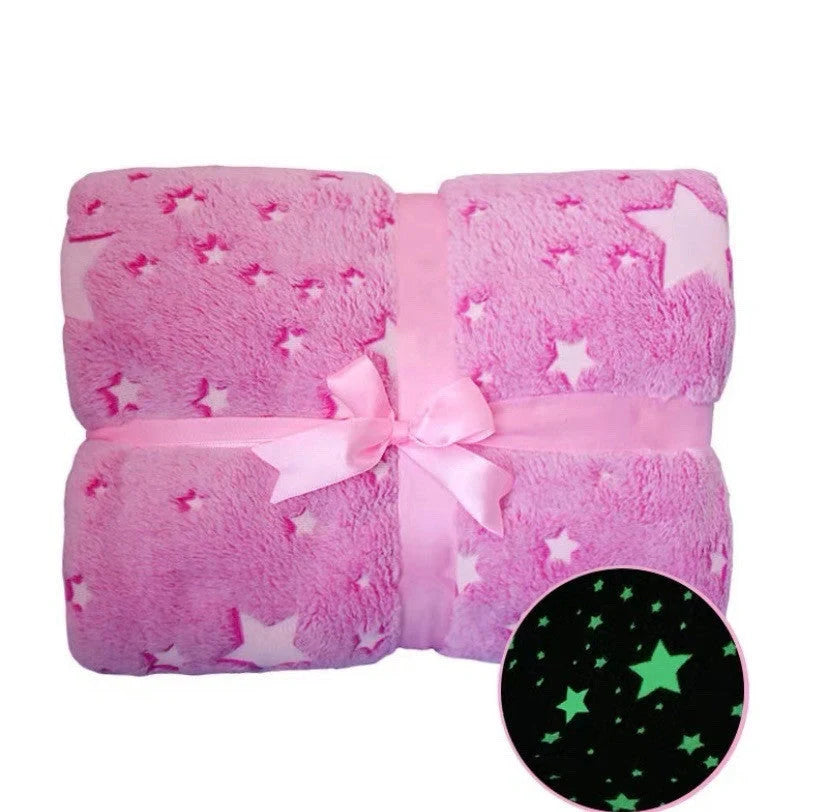 Glowing polyester wool blanket with stars and moons design, perfect for cosy nights
