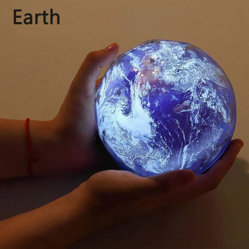 Celestial Starry Night Light projecting a mesmerizing display of stars, planets, and galaxies on the wall and ceiling
