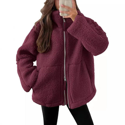Classic padded fleece jacket in various colours for women, featuring a zip-up design and pockets