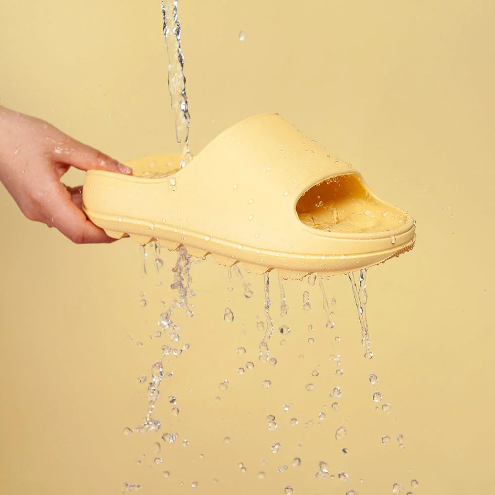 Thick-soled EVA slippers in various colours with non-slip sole and water leakage design