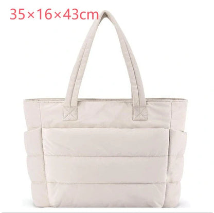 Premium cotton handbag with spacious design, secure zip-top closure, and thoughtful interior organisation for daily use