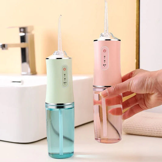 Rechargeable dental water flosser with multiple colour options and USB charging capability