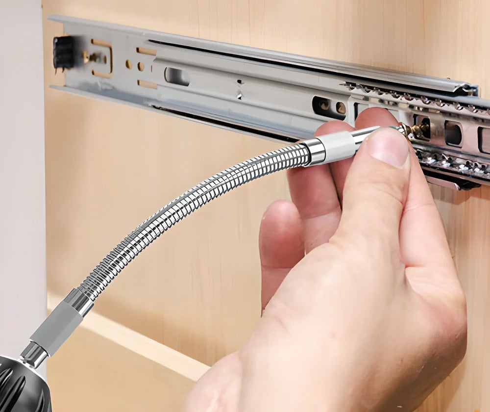 A flexible drill bit extender made of soft metal that can be bent, twisted, and rotated to reach tight spaces