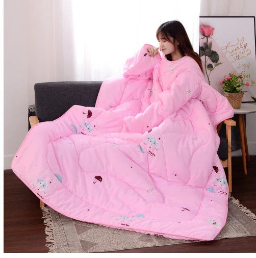 Cozy quilted lounger with sleeves in various colors and sizes, perfect for year-round indoor comfort and relaxation.