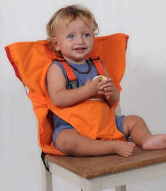 Portable baby dining chair seat with safety harness in various colors