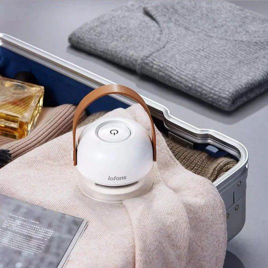 Rechargeable Hairball Removal Shaving Machine in white, compact and efficient for fabric care