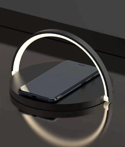 Foldable wireless charging stand with integrated LED table lamp for smartphones