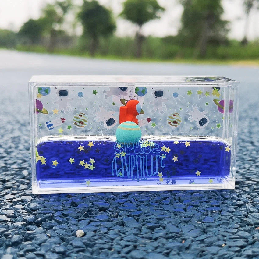 Acrylic liquid quicksand floating astronaut ornament in various colours