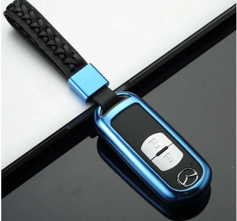 Aluminium alloy key case for Mazda with CNC engraving in sapphire, blue, grey, and rose gold