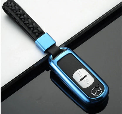 Aluminium alloy key case for Mazda with CNC engraving in sapphire, blue, grey, and rose gold
