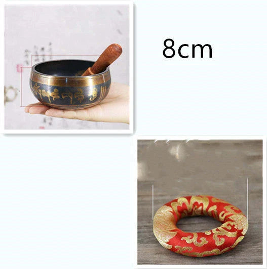 A handcrafted Tibetan singing bowl made of copper, used for meditation and relaxation.