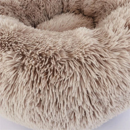 Cosy round plush cat mattress for winter warmth, available in various colours and sizes