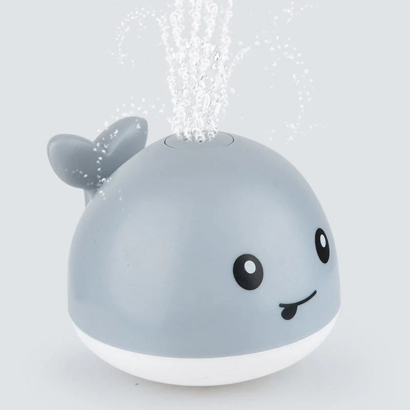 Electric induction whale spray toy for baby bath time with automatic water spray and lights