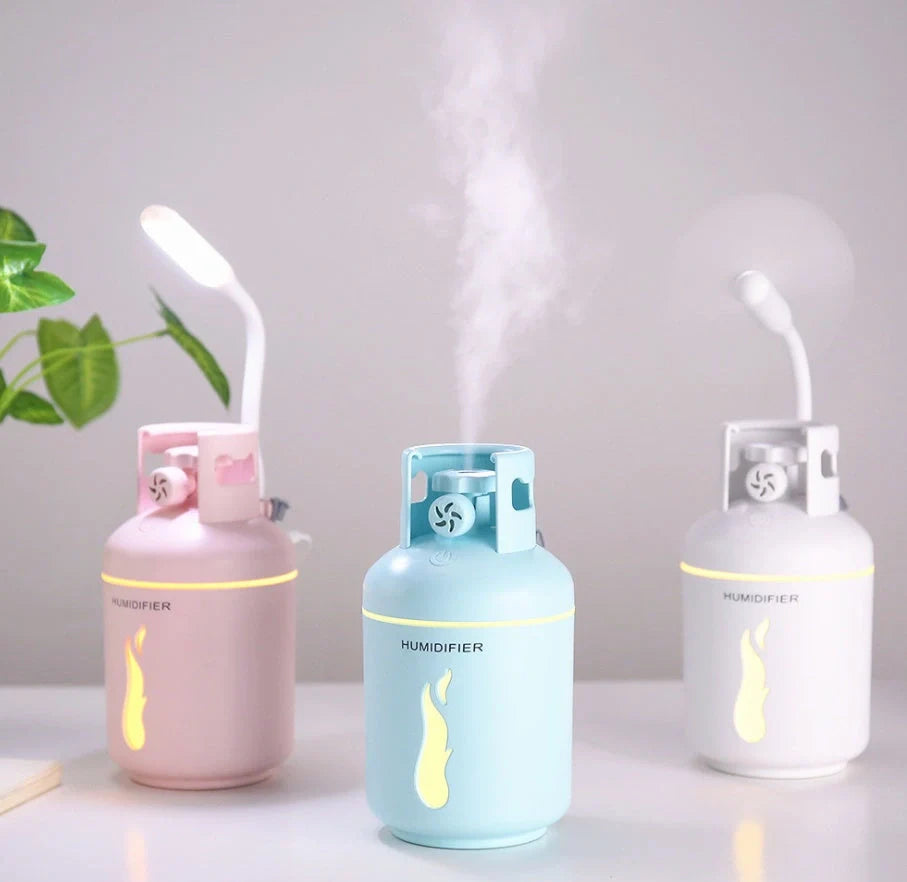 Multifunctional gas tank humidifier with USB connectivity in pink, blue, and white