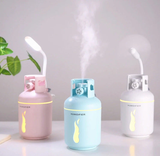 Multifunctional gas tank humidifier with USB connectivity in pink, blue, and white