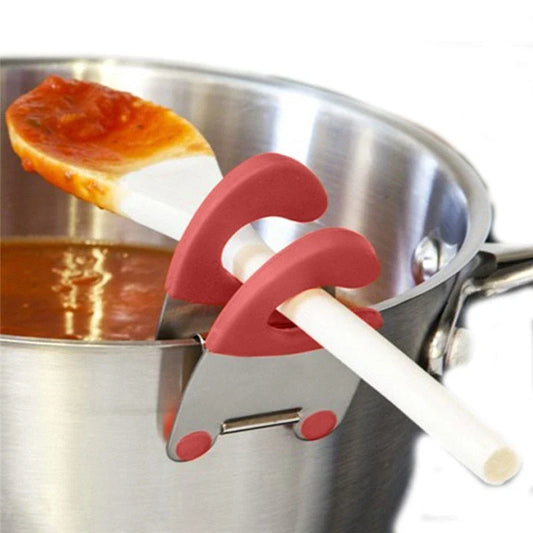 Premium stainless steel utensil holder with silicone lining and tilted design to prevent spills and keep cooking tools accessible