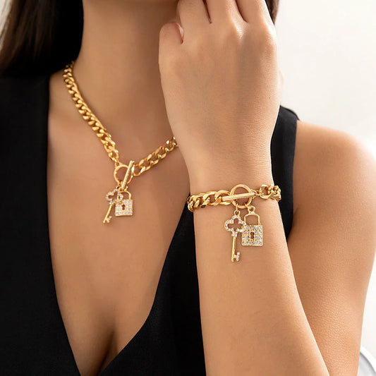 Elegant chain necklace and bracelet set with lustrous lock and key pendant for British ladies
