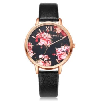 Rose gold quartz wrist watch with leather strap for women